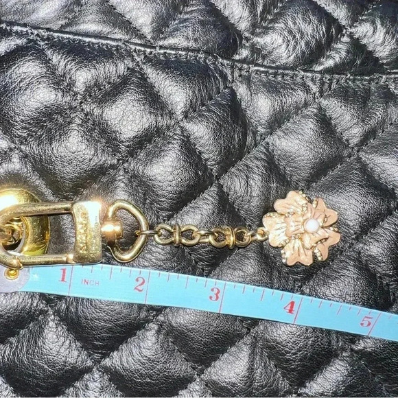 St. John Women's Black Leather Quilted Handbag
Purse Gold Tone hardware W/ Charm - Picture 16 of 16